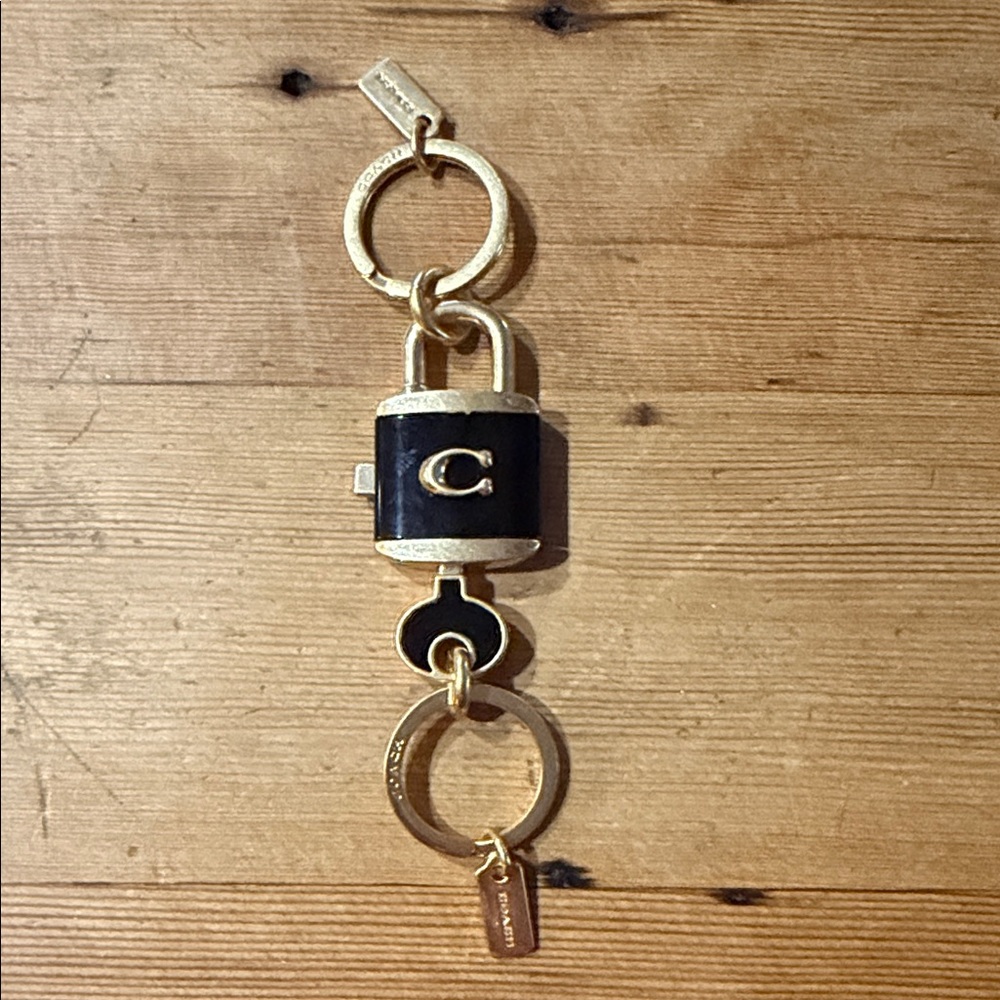 Coach Gold and Black Padlock Keychain
